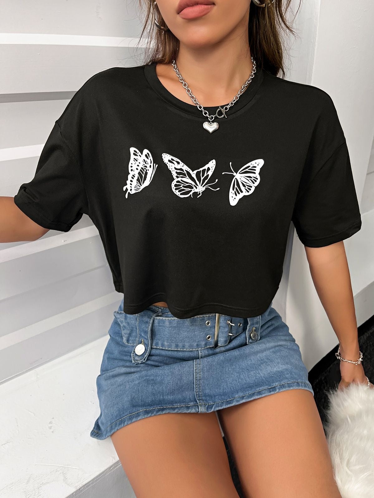 CAMISETA CORTA MUJER -
MARIPOSAS