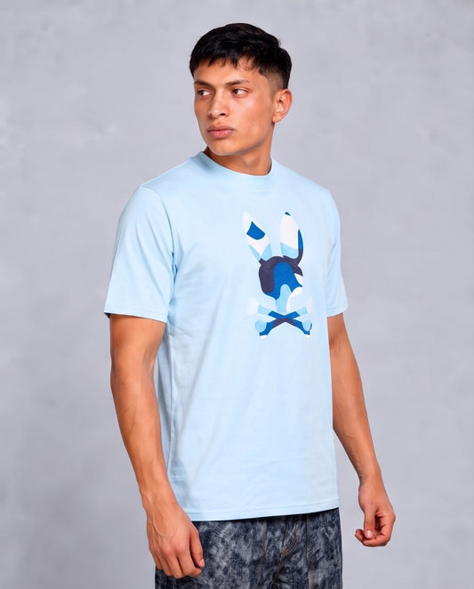 Camiseta azul claro Psycho Bunny conejo abstracto, vista de tres cuartos