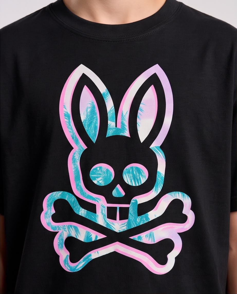 Camiseta Niño Psycho Bunny Calavera Hojas Turquesa Contorno Rosa Negra Semi Oversize