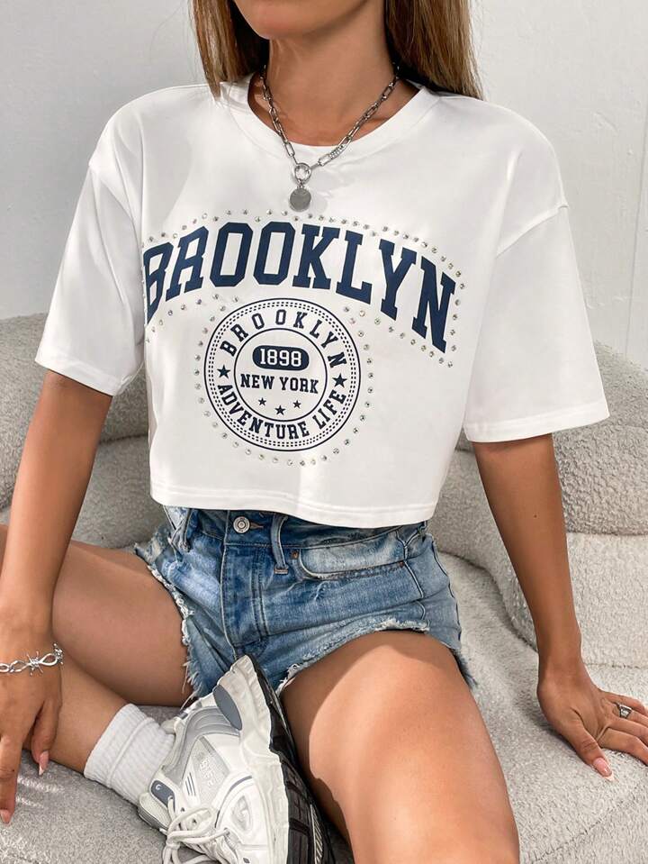 CAMISETA CORTA MUJER -
 BROOKLYN