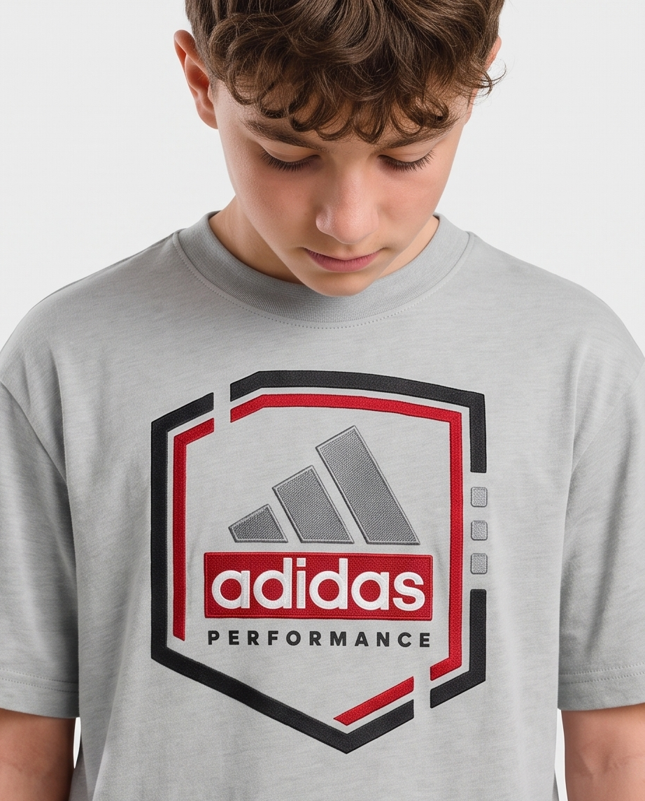 Camiseta Adidas Performance Shield Oversize Niños Verde Seco - Detalle estampado