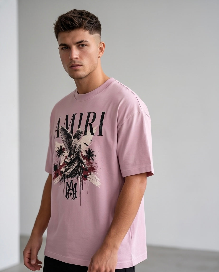 Camiseta Amiri MA Angel Palm Tree Drip Splatter Vintage Rosa - Lifestyle modelo vista lateral fondo neutro gris claro