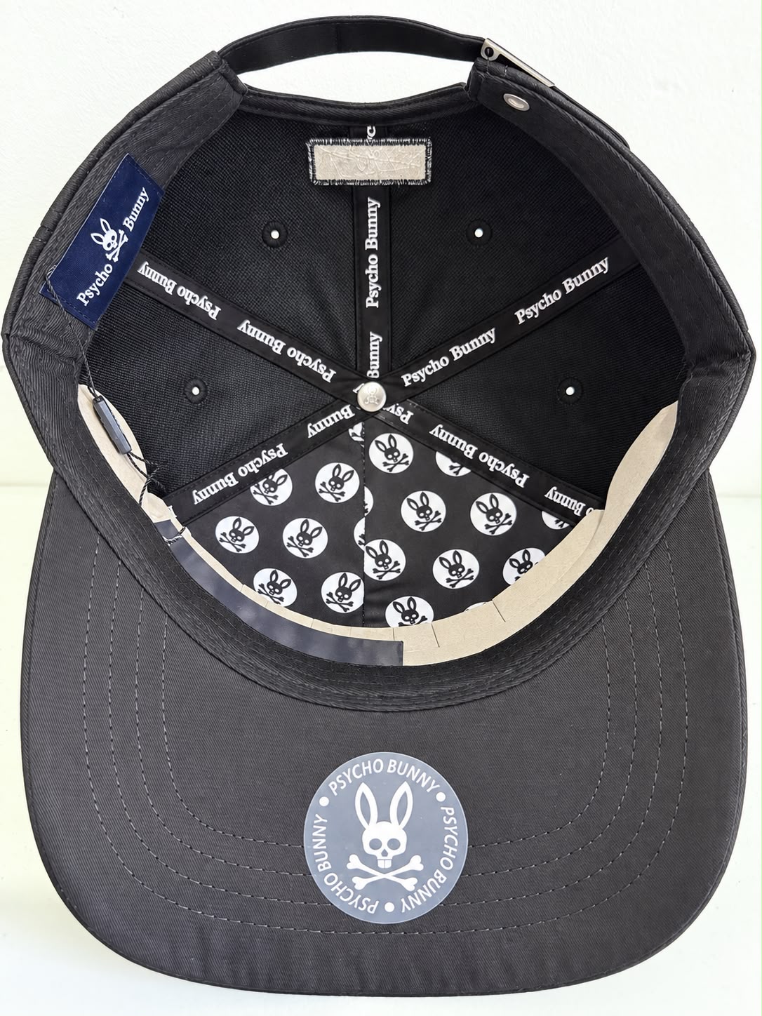 Gorra Psycho Bunny negra vista frontal