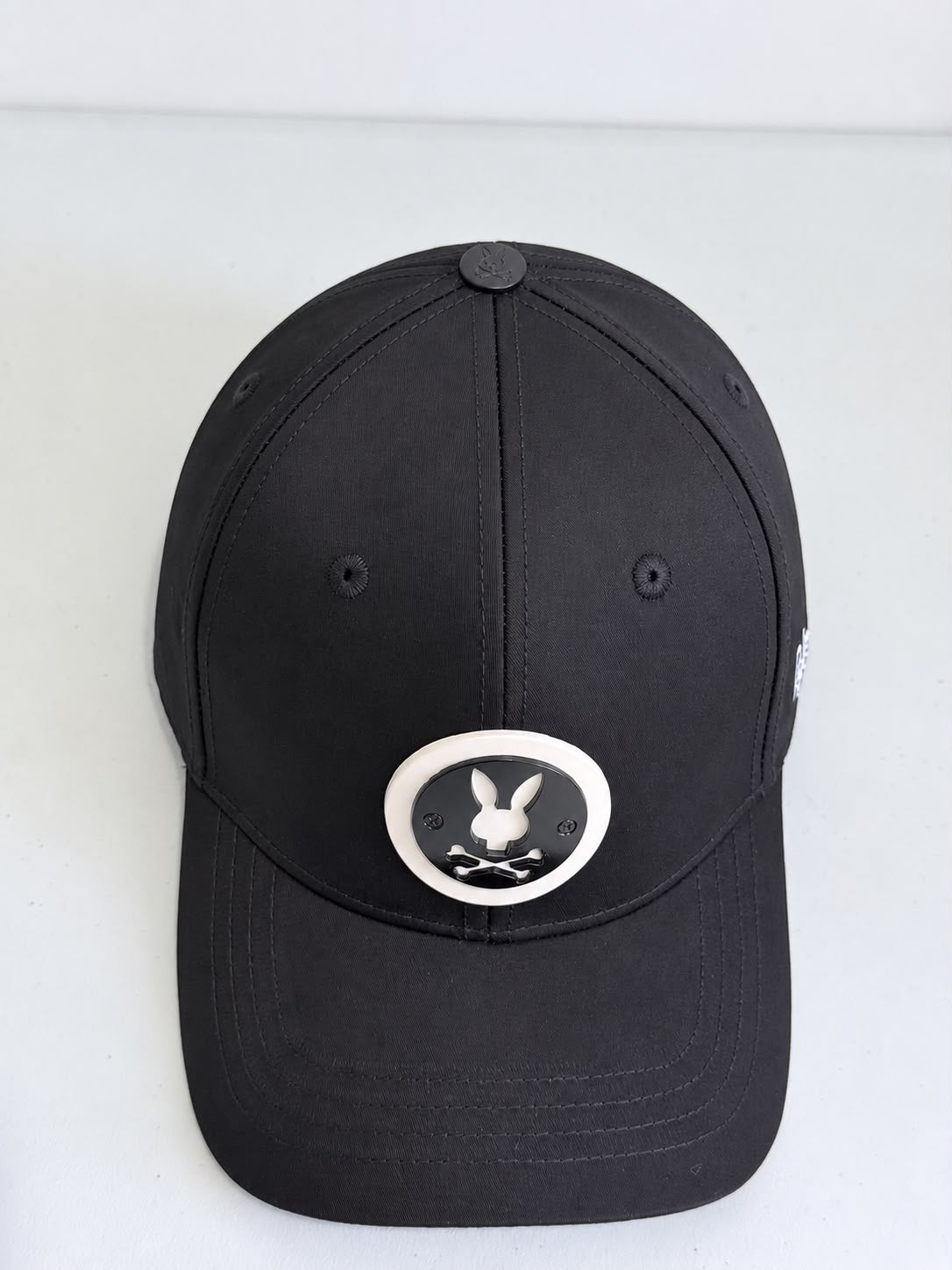 Gorra Psycho Bunny negra vista superior