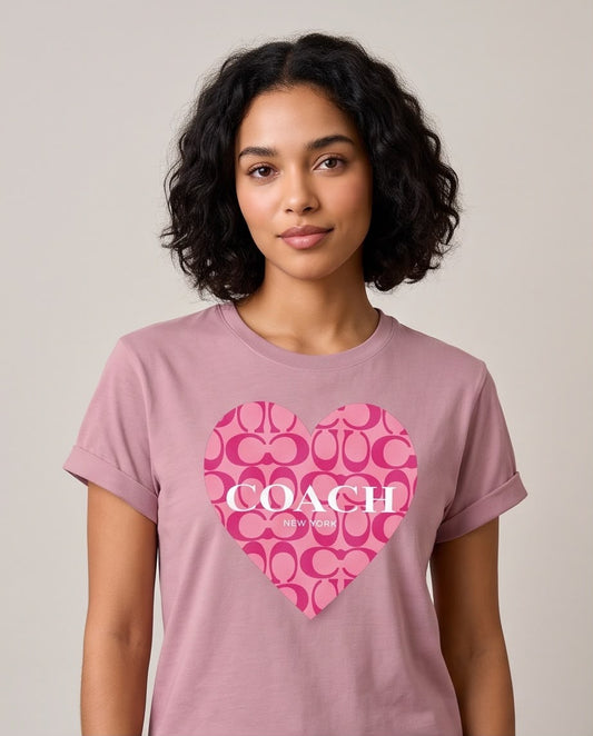 Camiseta rosa viejo con estampado de corazón Coach New York, vista frontal