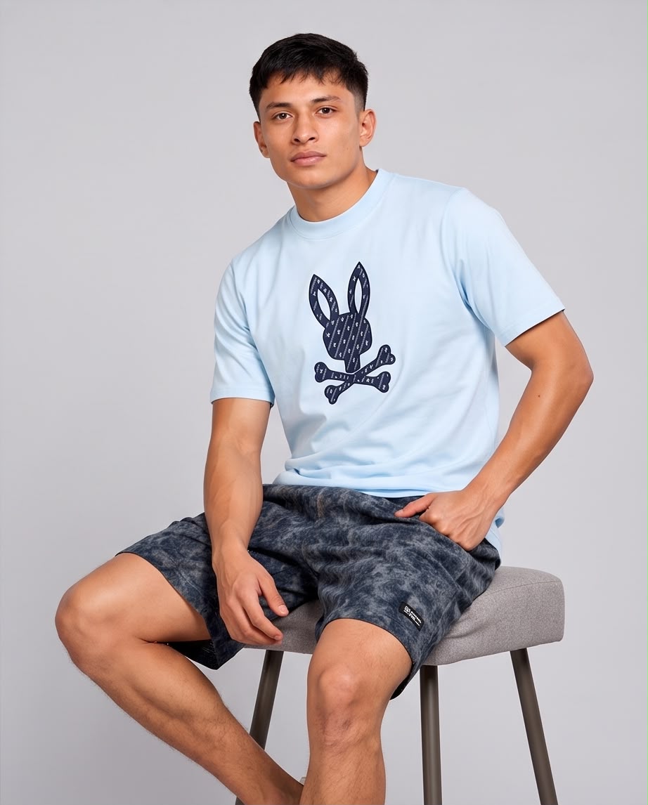 Camiseta Psycho Bunny Conejo Monograma azul claro, vista de tres cuartos