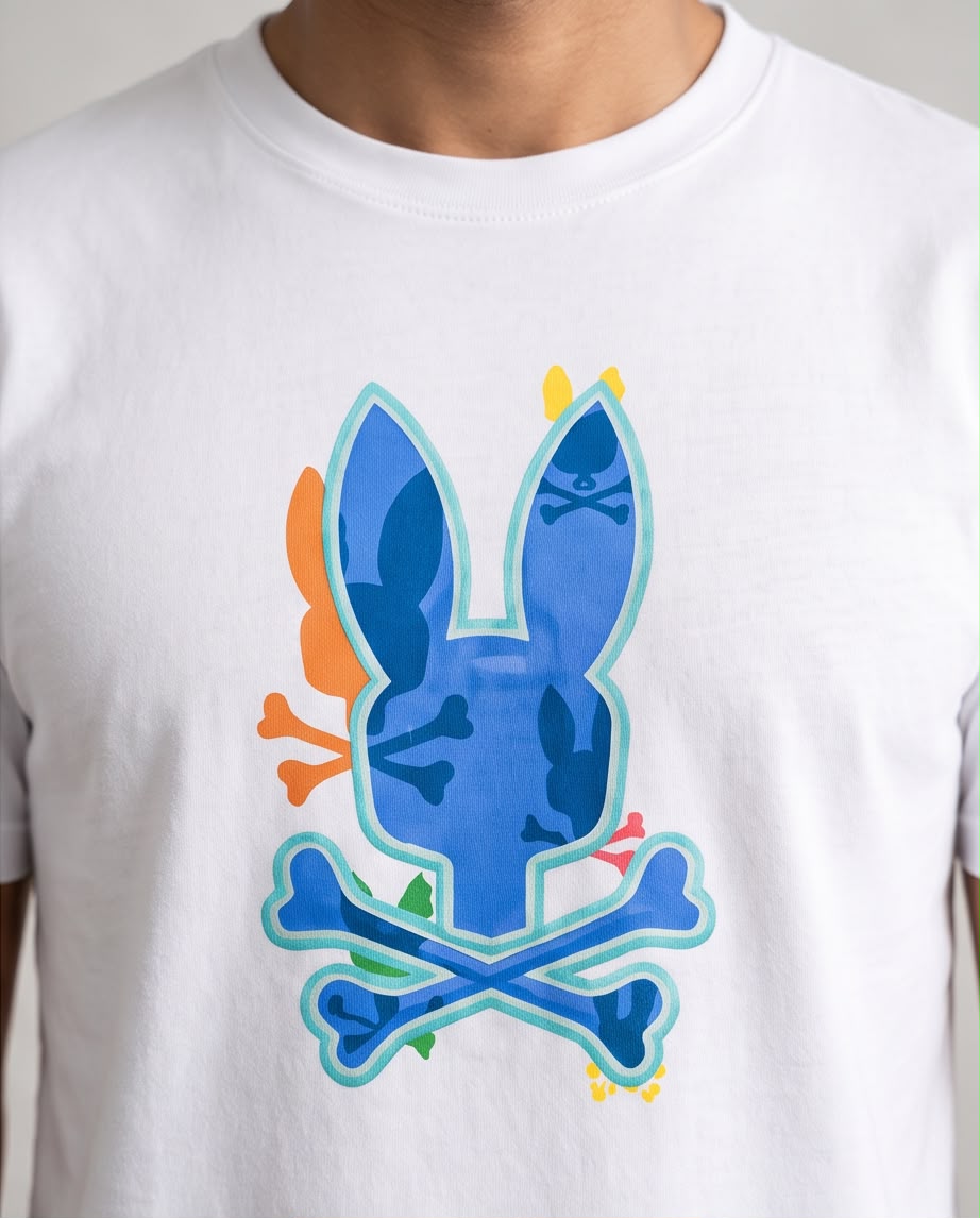 Detalle del conejo azul con contorno menta y detalles multicolor