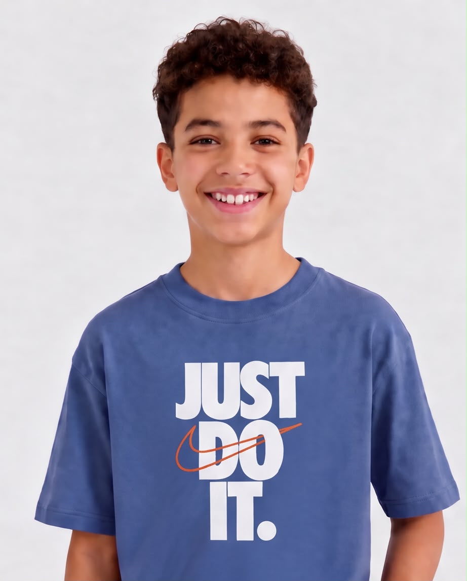 Camiseta Niño Nike Just Do It Azul Acero Semi Oversize