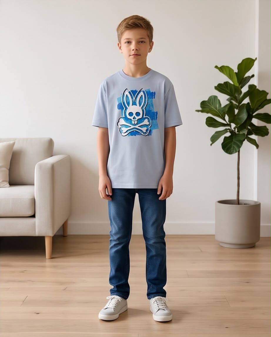 Camiseta Niño Psycho Bunny Calavera Blanca Pinceladas Azules Azul Cielo Semi Oversize