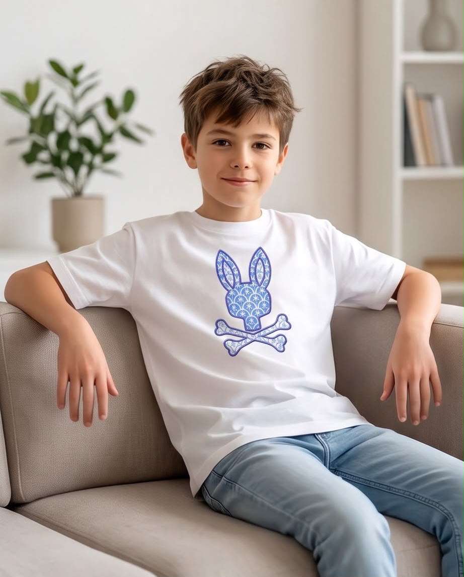Camiseta Niño Psycho Bunny Patrón Ornamental Azul Blanca Semi Oversize