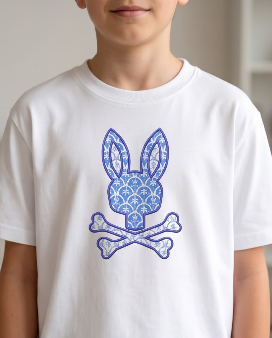 Camiseta Niño Psycho Bunny Patrón Ornamental Azul Blanca Semi Oversize